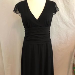 Moda International black dress with lace sleeves.